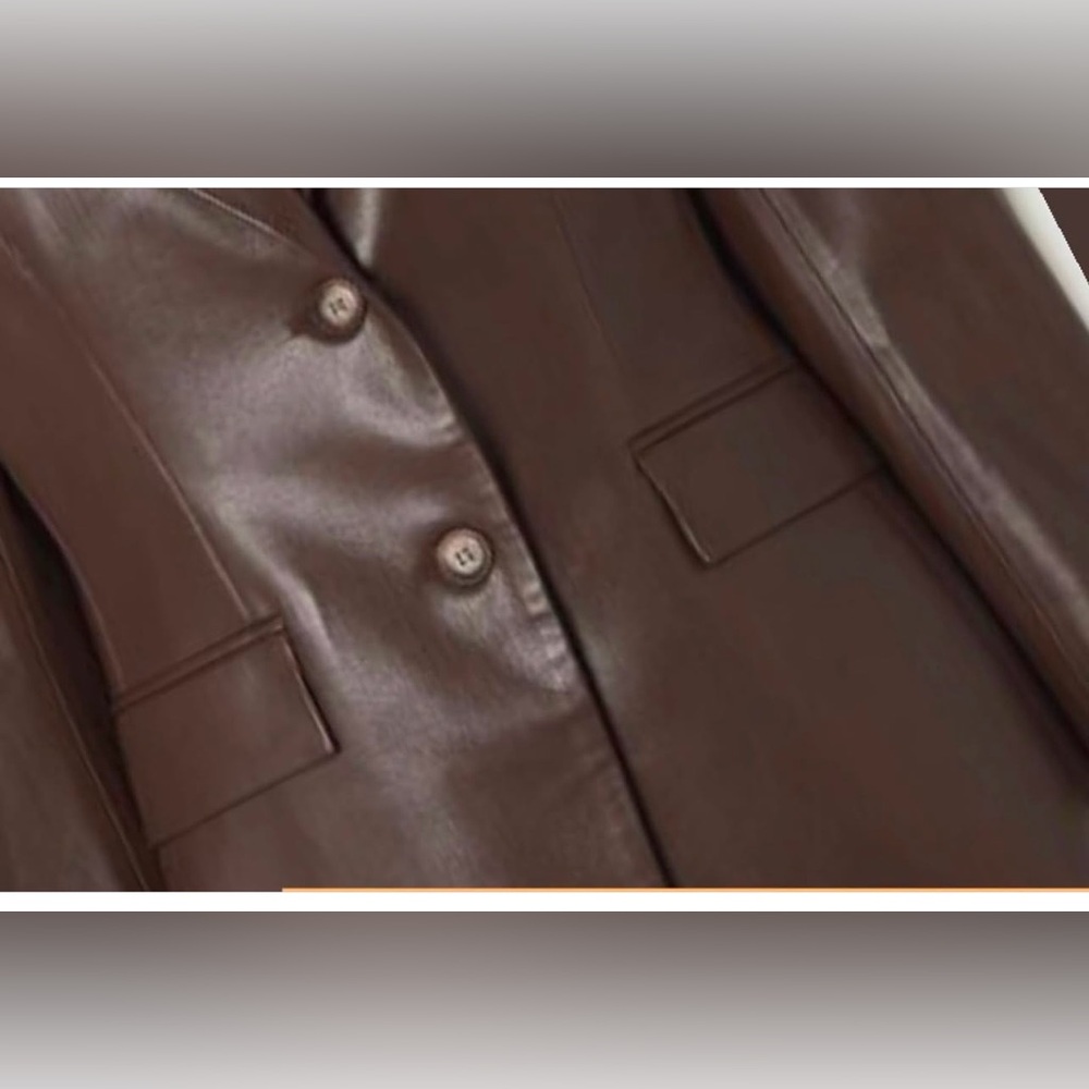 100% soft brown leather lined blazer.